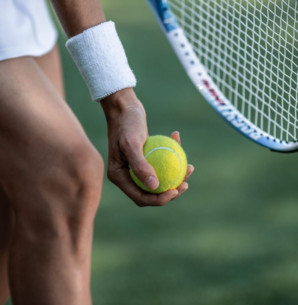 tennis-player-in-sportswear-with-a-ball.jpg